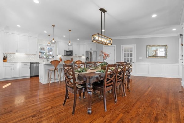 Dining room, Interior, Kitchen, Pendant Lights, Recessed Lighting, Stainless Steel Appliances, Wood Texture Flooring