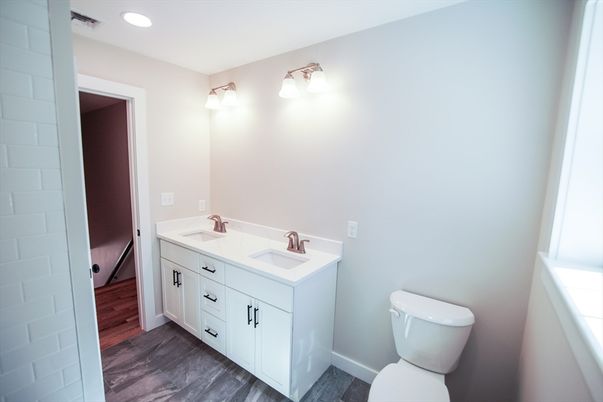 Bathroom, Dual Sink Vanities, Interior, Recessed Lighting, Wood Texture Flooring