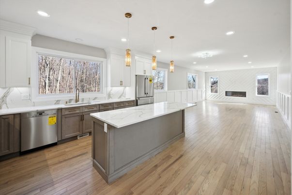 Fireplace, Interior, Kitchen, Pendant Lights, Recessed Lighting, Stainless Steel Appliances, Wood Texture Flooring