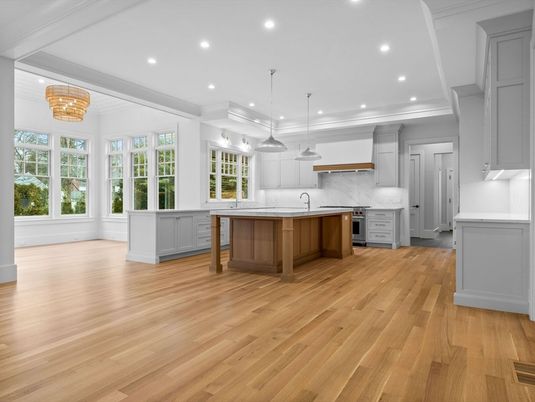 Interior, Kitchen, Marble Walls, Pendant Lights, Recessed Lighting, Stainless Steel Appliances, Wood Texture Flooring