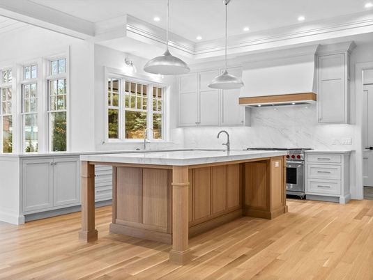 Interior, Kitchen, Marble Walls, Pendant Lights, Recessed Lighting, Stainless Steel Appliances, Wood Texture Flooring