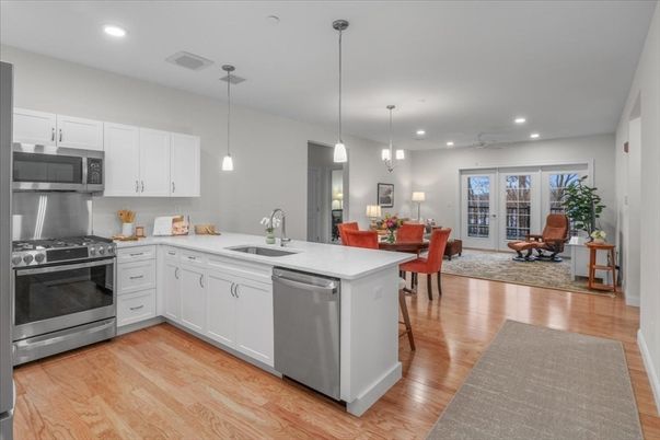 Dining room, Interior, Kitchen, Living room, Pendant Lights, Recessed Lighting, Stainless Steel Appliances, Wood Texture Flooring