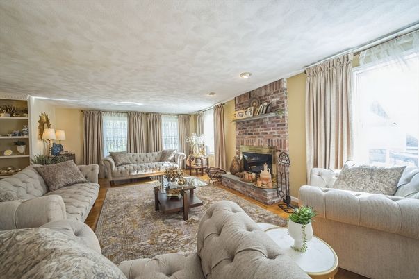 Fireplace, Interior, Living room, Recessed Lighting, Stone Walls, Wood Texture Flooring