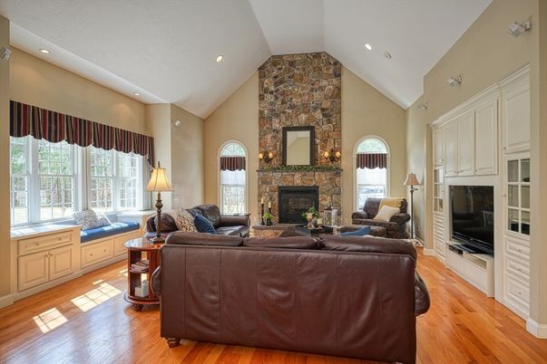 Fireplace, Interior, Living room, Recessed Lighting, Stone Walls, Wood Texture Flooring
