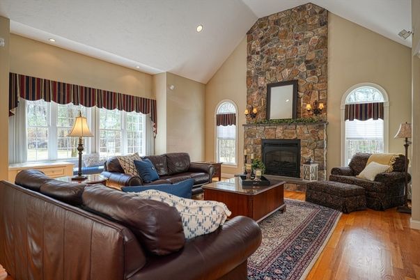 Fireplace, Interior, Living room, Recessed Lighting, Stone Walls, Wood Texture Flooring