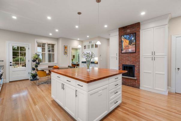 Fireplace, Interior, Kitchen, Pendant Lights, Recessed Lighting, Stone Walls, Wood Texture Flooring
