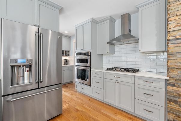 Interior, Kitchen, Recessed Lighting, Stainless Steel Appliances, Stone Walls, Wood Texture Flooring