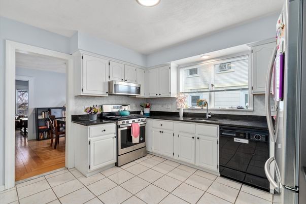 Dining room, Interior, Kitchen, Recessed Lighting, Stainless Steel Appliances, Wood Texture Flooring