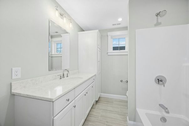Bathroom, Dual Sink Vanities, Interior, Recessed Lighting, Wood Texture Flooring