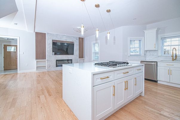 Fireplace, Interior, Kitchen, Pendant Lights, Stainless Steel Appliances, Wood Texture Flooring