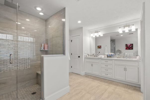 Bathroom, Dual Sink Vanities, Glass Shower, Interior, Recessed Lighting, Wood Texture Flooring