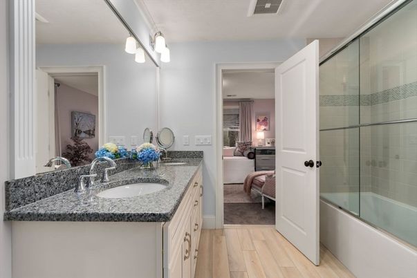 Bathroom, Bedroom, Dual Sink Vanities, Glass Shower, Interior, Wood Texture Flooring