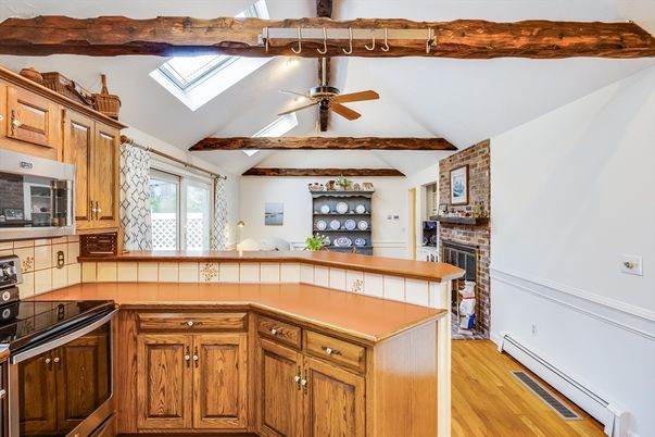Fireplace, Interior, Kitchen, Tile Countertops, Wooden Beams, Wood Texture Flooring
