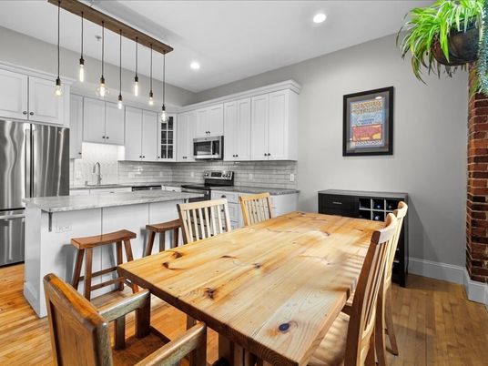 Dining room, Interior, Kitchen, Pendant Lights, Recessed Lighting, Stainless Steel Appliances, Wood Texture Flooring