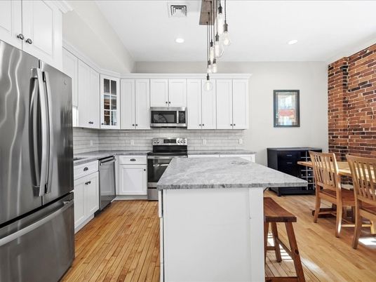 Interior, Kitchen, Pendant Lights, Recessed Lighting, Stainless Steel Appliances, Stone Walls, Wood Texture Flooring