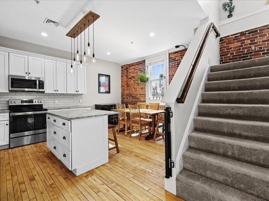Dining room, Interior, Kitchen, Pendant Lights, Recessed Lighting, Stainless Steel Appliances, Stone Walls, Wood Texture Flooring