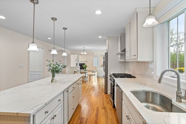 Dining room, Interior, Kitchen, Pendant Lights, Recessed Lighting, Stainless Steel Appliances, Wood Texture Flooring