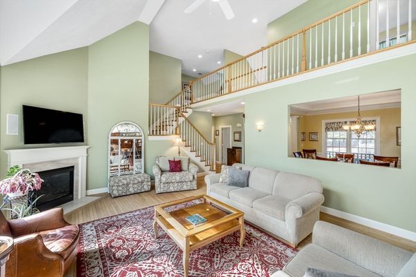 Chandelier, Dining room, Fireplace, Interior, Living room, Recessed Lighting, Wood Texture Flooring