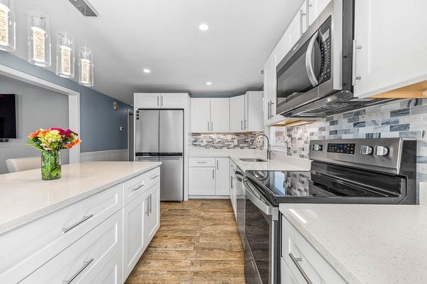 Interior, Kitchen, Recessed Lighting, Stainless Steel Appliances, Wood Texture Flooring
