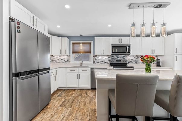Interior, Kitchen, Pendant Lights, Recessed Lighting, Stainless Steel Appliances, Wood Texture Flooring