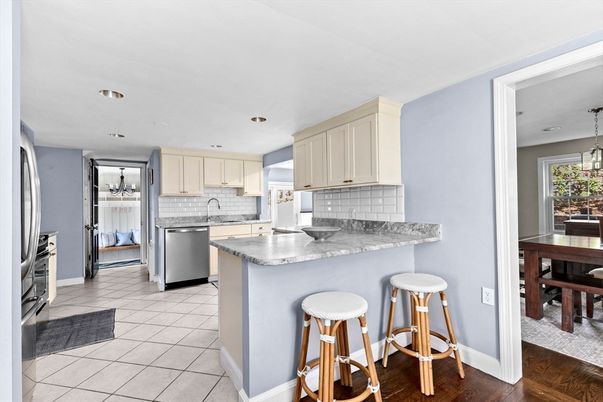 Dining room, Interior, Kitchen, Pendant Lights, Recessed Lighting, Stainless Steel Appliances, Wood Texture Flooring