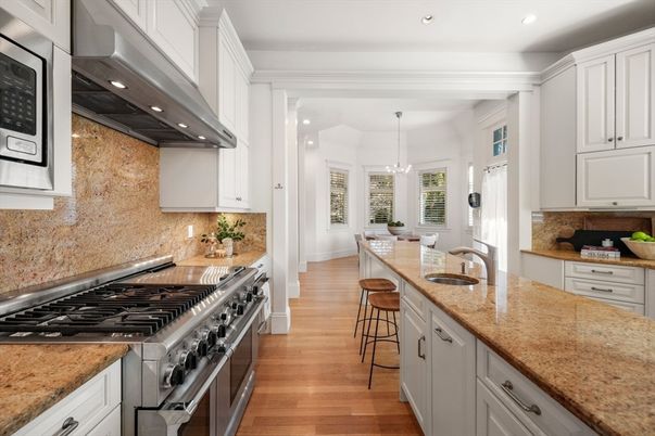 Dining room, Interior, Kitchen, Pendant Lights, Recessed Lighting, Stainless Steel Appliances, Wood Texture Flooring
