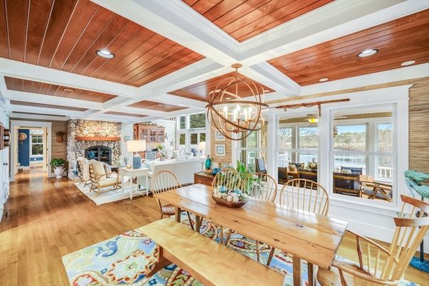 Chandelier, Dining room, Fireplace, Interior, Living room, Recessed Lighting, Stone Walls, Wooden Ceilings, Wood Texture Flooring