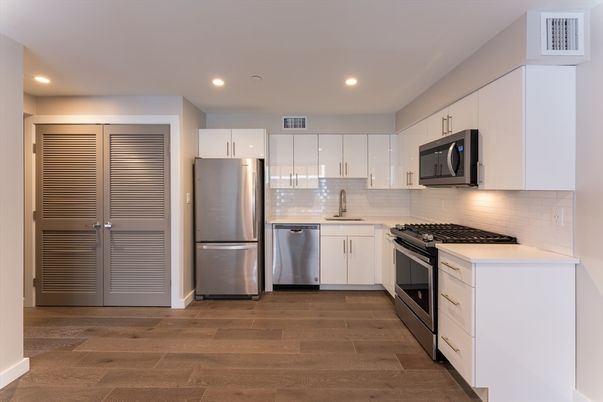 Interior, Kitchen, Recessed Lighting, Stainless Steel Appliances, Wood Texture Flooring
