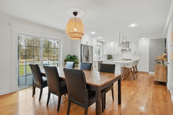 Dining room, Interior, Kitchen, Pendant Lights, Recessed Lighting, Stainless Steel Appliances, Wood Texture Flooring