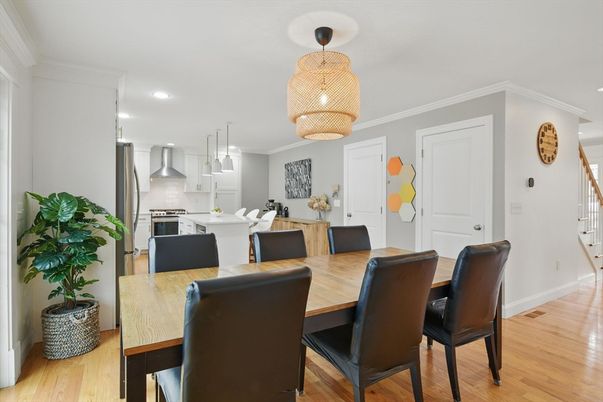 Dining room, Interior, Kitchen, Pendant Lights, Recessed Lighting, Stainless Steel Appliances, Wood Texture Flooring