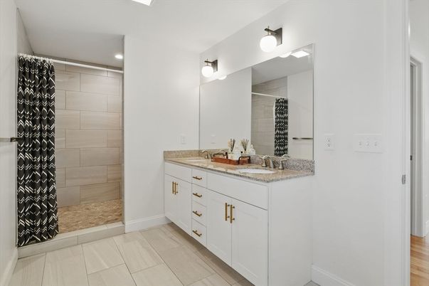 Bathroom, Dual Sink Vanities, Interior, Recessed Lighting, Wood Texture Flooring