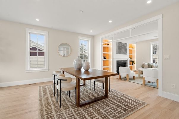 Dining room, Fireplace, Interior, Living room, Recessed Lighting, Wood Texture Flooring