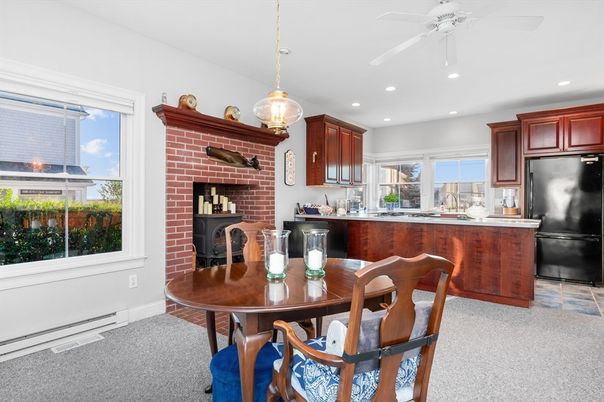 Dining room, Fireplace, Interior, Kitchen, Pendant Lights, Recessed Lighting, Stainless Steel Appliances, Stone Walls