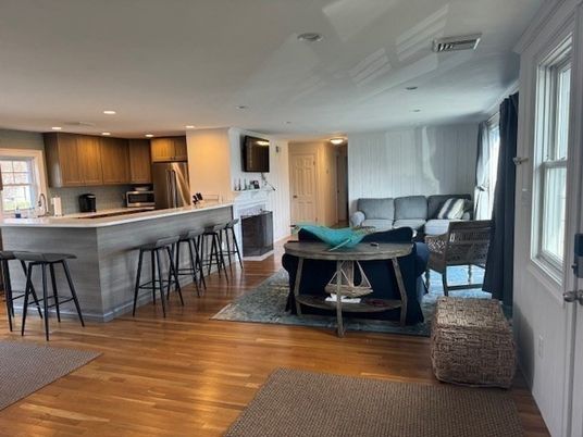 Fireplace, Interior, Kitchen, Living room, Recessed Lighting, Stainless Steel Appliances, Wood Texture Flooring