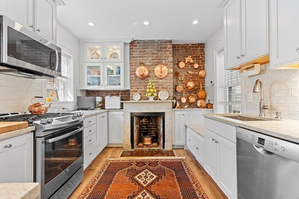 Fireplace, Interior, Kitchen, Recessed Lighting, Stainless Steel Appliances, Stone Walls, Wood Texture Flooring