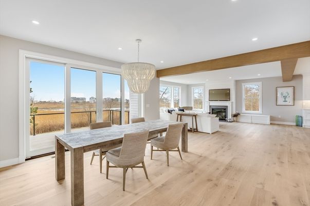 Chandelier, Dining room, Fireplace, Interior, Living room, Recessed Lighting, Wooden Beams, Wood Texture Flooring