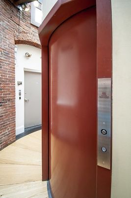 Elevator, Interior, Stone Walls, Wood Texture Flooring