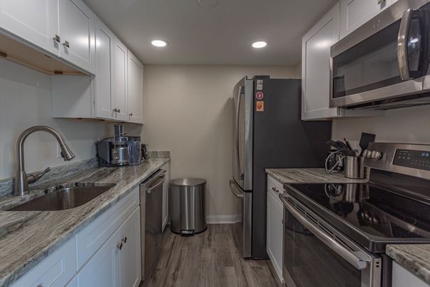 Interior, Kitchen, Recessed Lighting, Stainless Steel Appliances, Wood Texture Flooring
