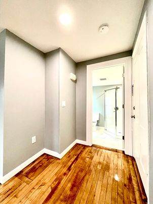 Bathroom, Empty room, Glass Shower, Interior, Recessed Lighting, Wood Texture Flooring