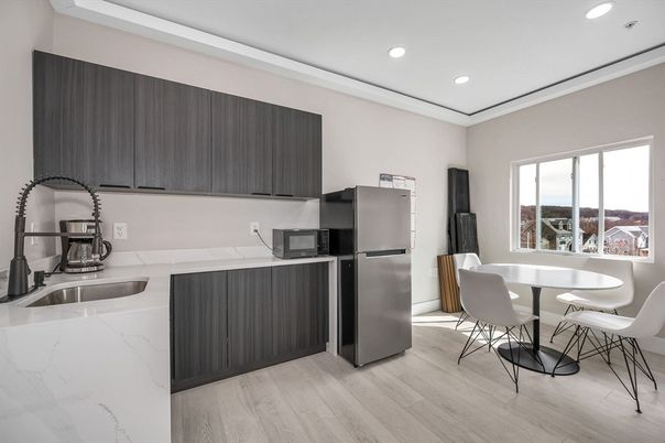 Dining room, Interior, Kitchen, Recessed Lighting, Stainless Steel Appliances, Wood Texture Flooring
