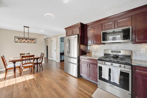 Dining room, Interior, Kitchen, Pendant Lights, Recessed Lighting, Stainless Steel Appliances, Wood Texture Flooring