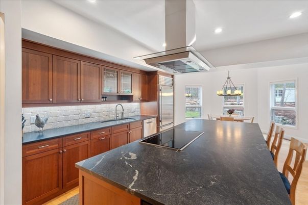 Dining room, Interior, Kitchen, Pendant Lights, Recessed Lighting, Stainless Steel Appliances, Wood Texture Flooring