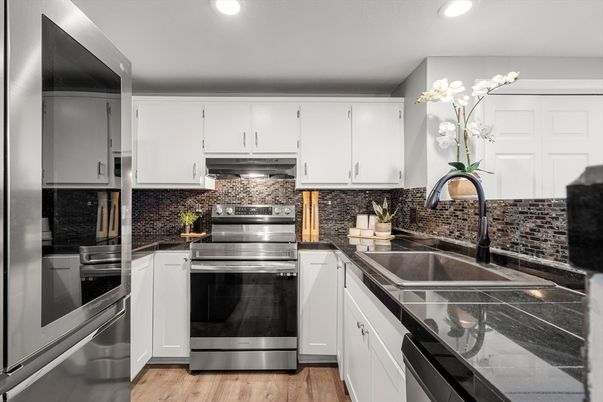 Interior, Kitchen, Recessed Lighting, Stainless Steel Appliances, Wood Texture Flooring