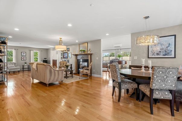 Dining room, Fireplace, Interior, Living room, Pendant Lights, Recessed Lighting, Wood Texture Flooring