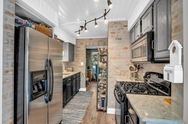 Interior, Kitchen, Stainless Steel Appliances, Stone Walls, Wood Texture Flooring