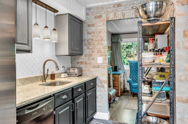 Interior, Kitchen, Pendant Lights, Stainless Steel Appliances, Stone Walls, Wood Texture Flooring
