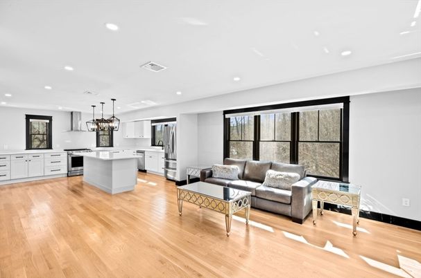 Chandelier, Interior, Kitchen, Living room, Pendant Lights, Recessed Lighting, Stainless Steel Appliances, Wood Texture Flooring