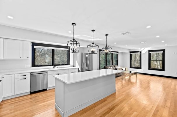 Dining room, Interior, Kitchen, Pendant Lights, Recessed Lighting, Stainless Steel Appliances, Wood Texture Flooring