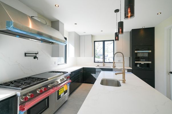 Interior, Kitchen, Marble Walls, Pendant Lights, Recessed Lighting, Stainless Steel Appliances