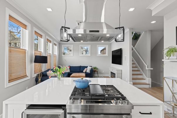 Fireplace, Interior, Kitchen, Living room, Pendant Lights, Recessed Lighting, Stainless Steel Appliances, Wood Texture Flooring